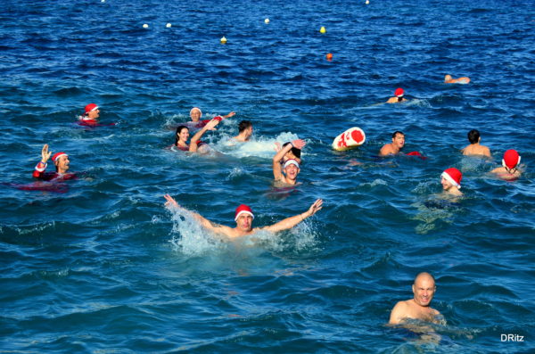 people swimming in December as part of the Thomas Smith Christmas Charity Swim